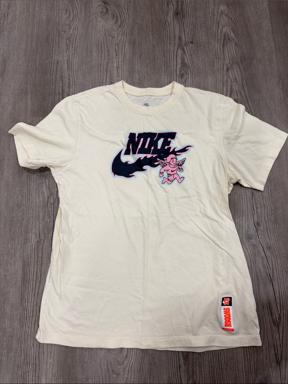 Nike butter yellow Tee with Black and Pink Graphic